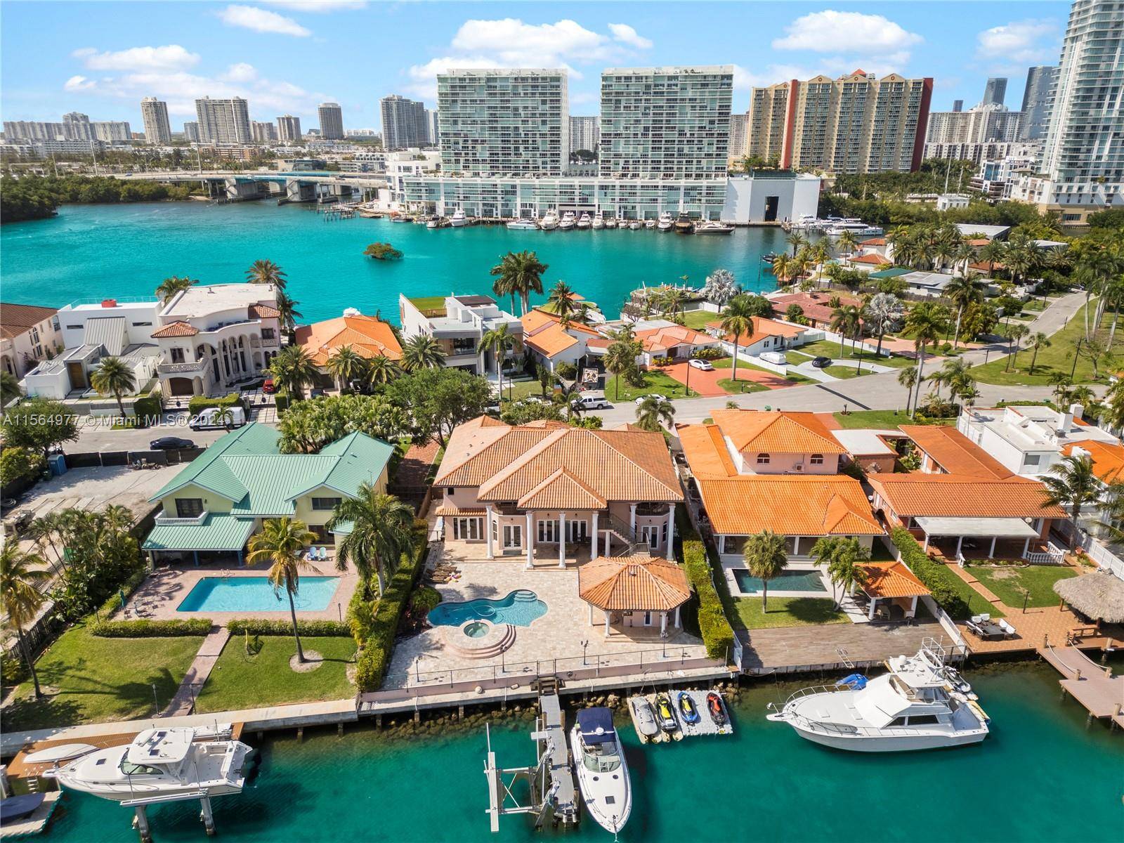 Exquisite Mediterranean waterfront home on Atlantic Isle, a secluded gem nestled between the luxury shopping destinations of Aventura and Bal Harbour.