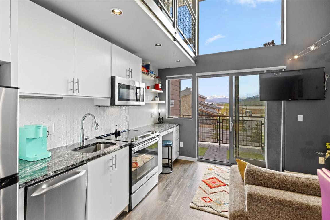 Wake up to views of Grays Torreys peaks from modern luxury right in the heart of Frisco.
