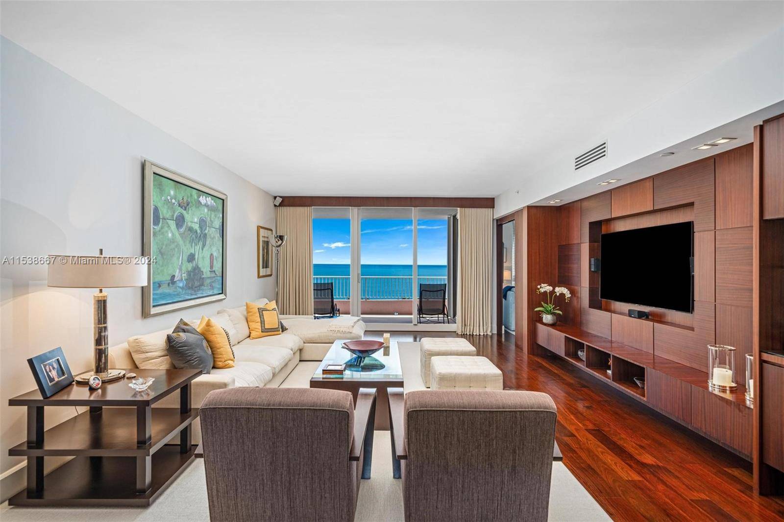Welcome to this exquisite residence at Ocean Club, boasting unobstructed views of the ocean, Biscayne Bay city skyline.