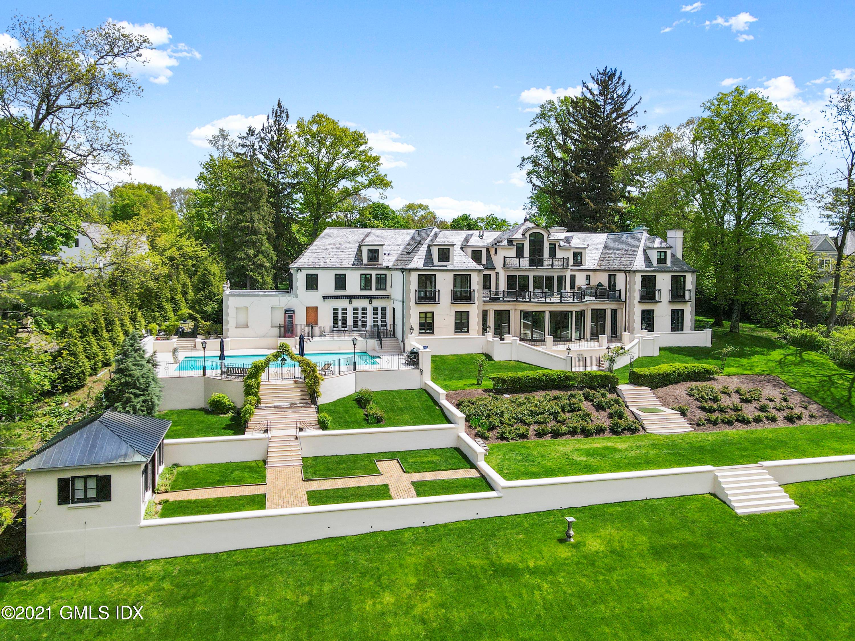Amazing multi year renovation of a 1928 10, 000 square foot French country manor with a ''backcountry'' feel located on a scenic lane just 1.