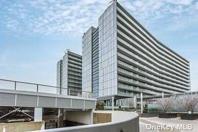 Prime Location ! Grand 2 High Floor Corner Unit with Balcony at the Most Luxurious Condo Complex in the Heart of Flushing.