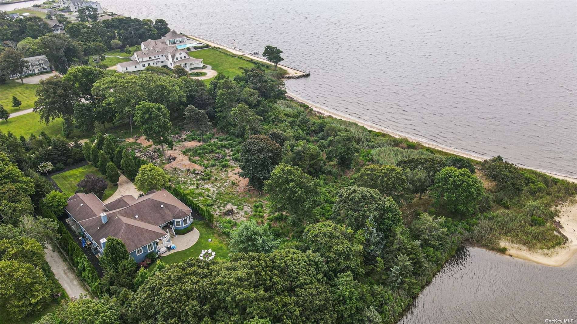 Welcome to a once in a lifetime opportunity to own a breathtaking piece of bayfront paradise.