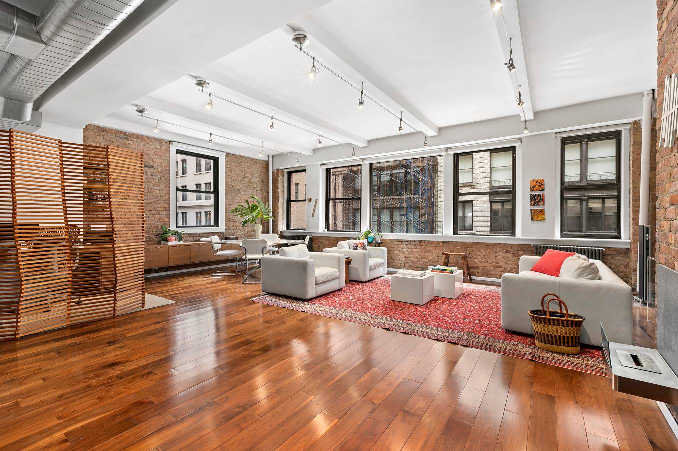 As the elevator opens, find yourself in this bright, spacious full floor loft in the heart of Manhattan's chic Flatiron district.