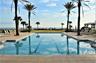 Oceanside pool with beach walk over.