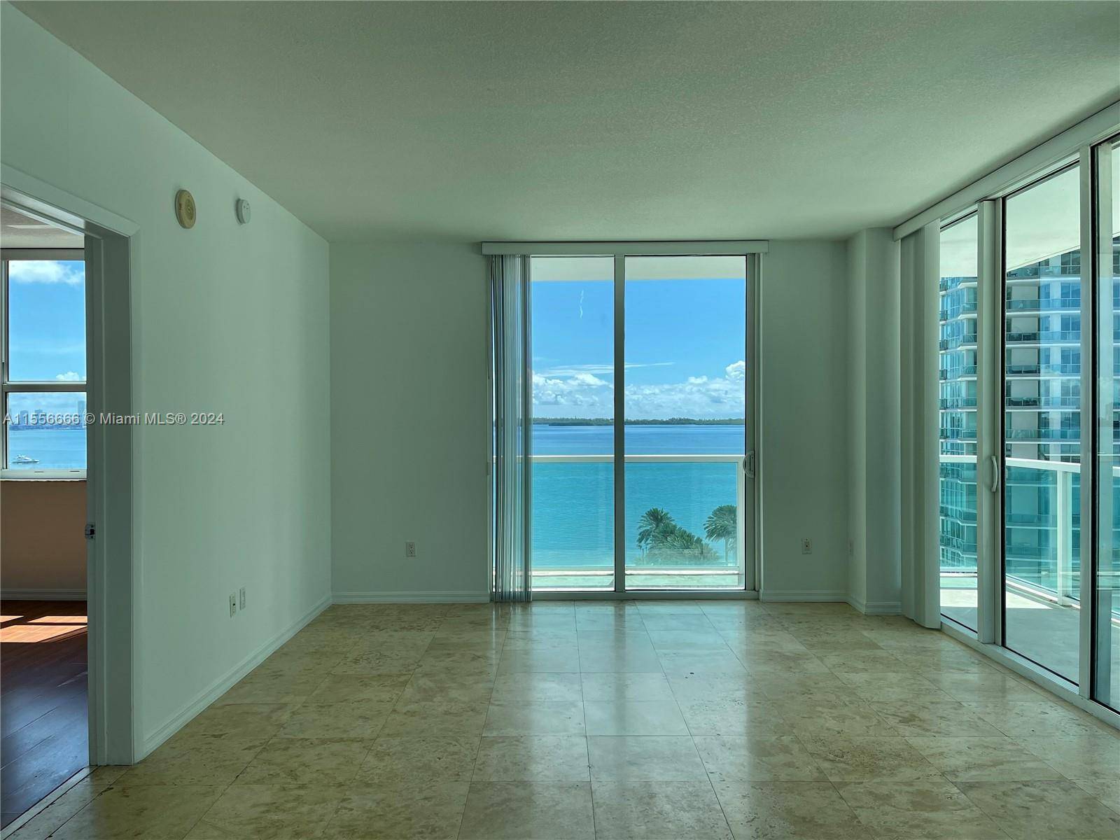 MODERN AND LUXURY APARTMENT, 2 BEDROOMS, 2 BATHROOMS WITH INCREDIBLE FRONT VIEW TO THE WATER, AND BALCONY SURROUNDING THE APARTMENT, IN BEDROOMS WOOD FLOOR AND LIVING ROOM, DINING ROOM, AND ...