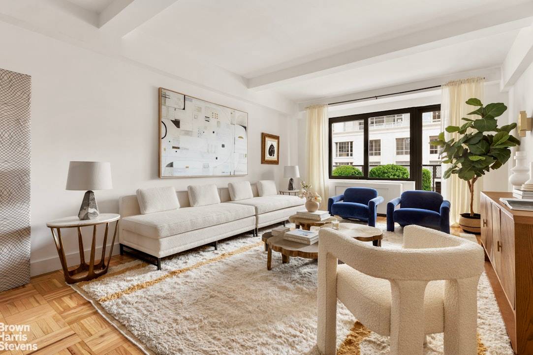 Located just off Park Avenue and moments away from Central Park, in the heart of the Upper East Side, residence 16C of this lovely boutique cooperative is flooded with cheerful ...