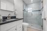 Bedroom 2 en suite bathroom with walk in shower