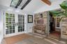 Welcoming foyer with skylights and original stone walls