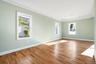 Unfurnished room featuring ornamental molding and light wood-type flooring