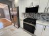 FIRST FLOOR STOVE, FRIDGE AND MICROWAVE