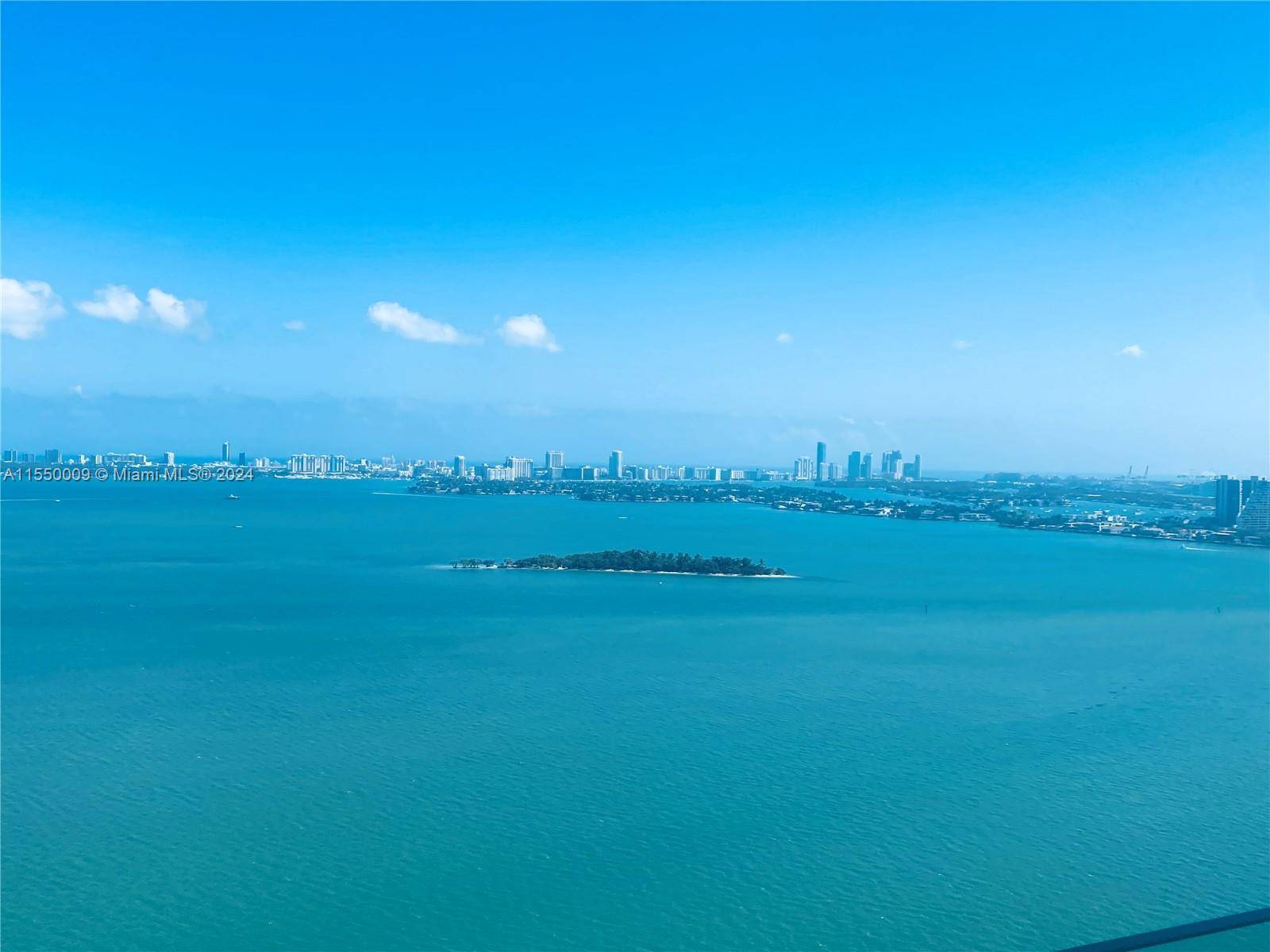 With an impressive 200 feet of frontage on Biscayne Bay, this residence has unobstructed views of the bay from every room in the apartment.
