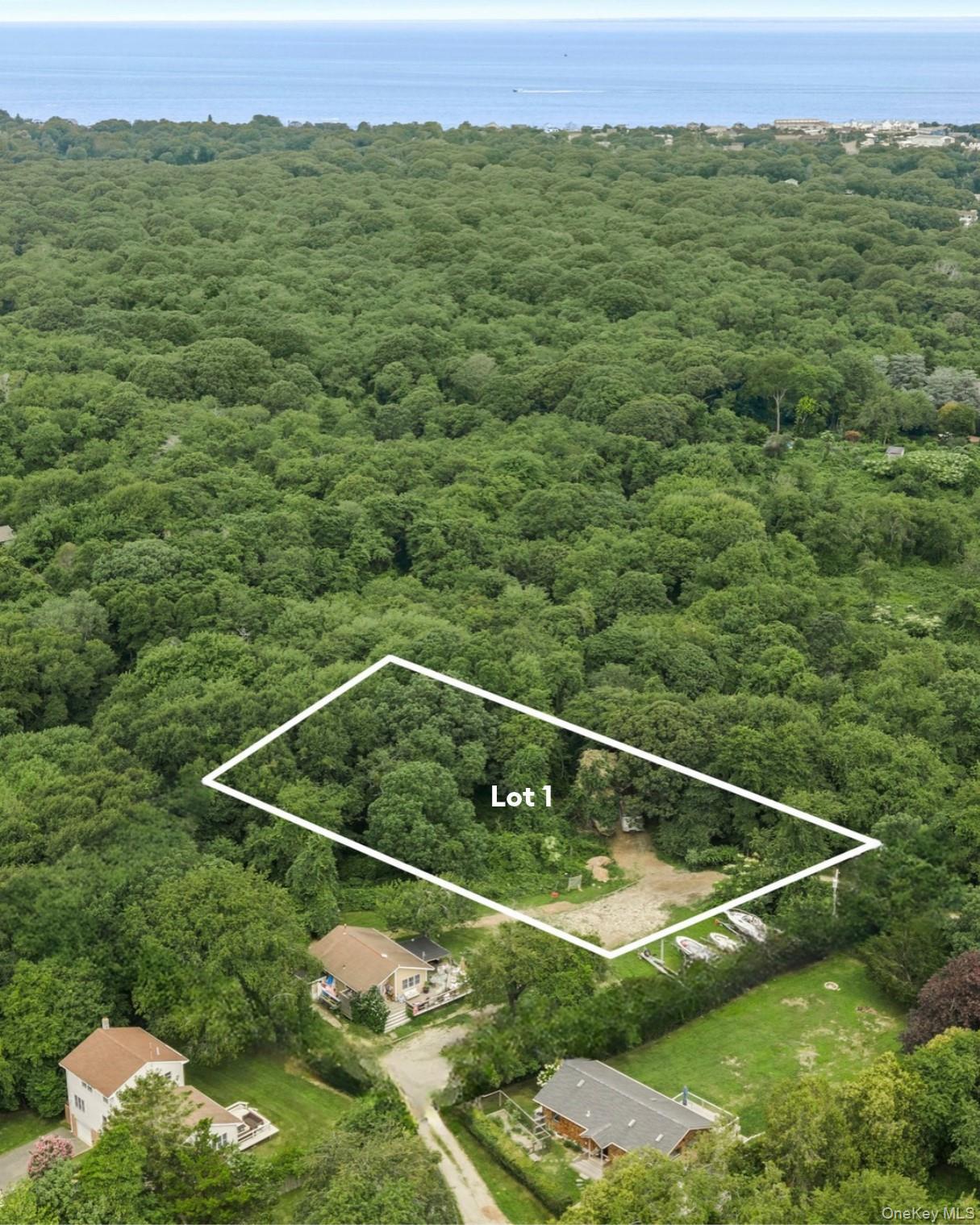 Rare Montauk land opportunity! Lot 1 set on approximately 0.8 acres in a private, wooded setting, this exceptional parcel offers a unique opportunity