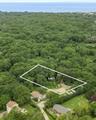 Rare Montauk land opportunity! Lot 1 set on approximately 0.8 acres in a private, wooded setting, this exceptional parcel offers a unique opportunity