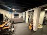 Basement includes laundry, seating, office and 2 cold storage areas.