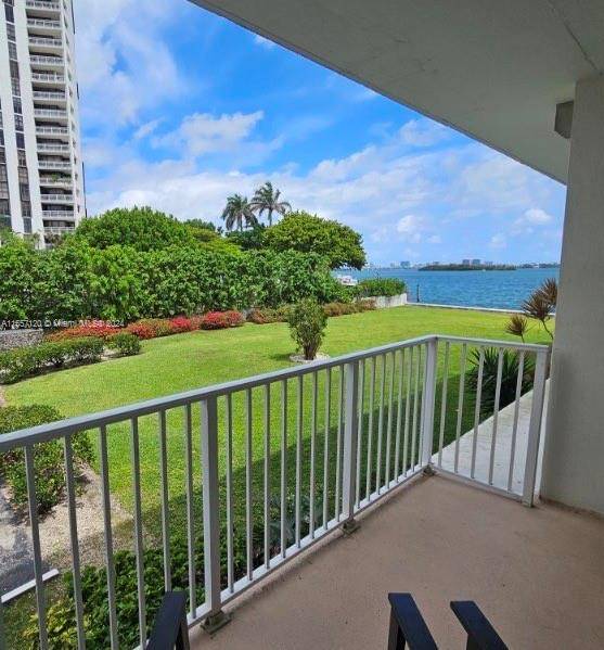 STUNNING BAY VIEW UNIT ! This spacious Miami Shores condo offers a secure community with bay front views ocean access.