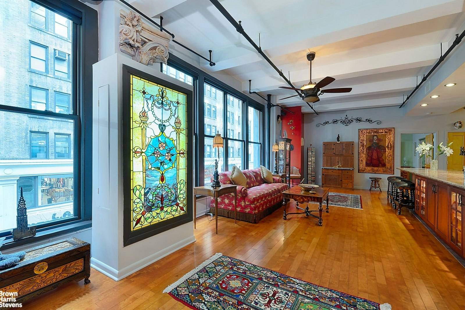 Large and exquisite Pre War loft in a former industrial building, its ceilings are 11 feet high.