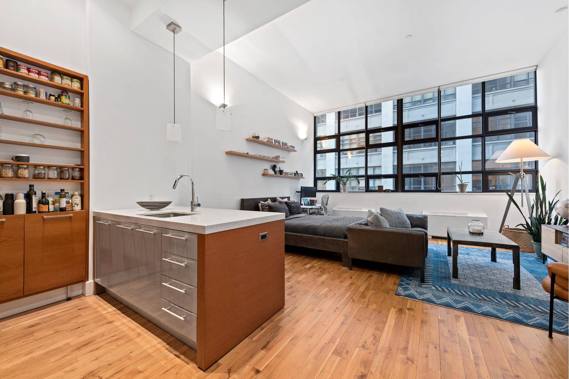 Come live in luxury on the waterfront in Brooklyn Bridge Park in this rarely available loft with 13' soaring ceilings.