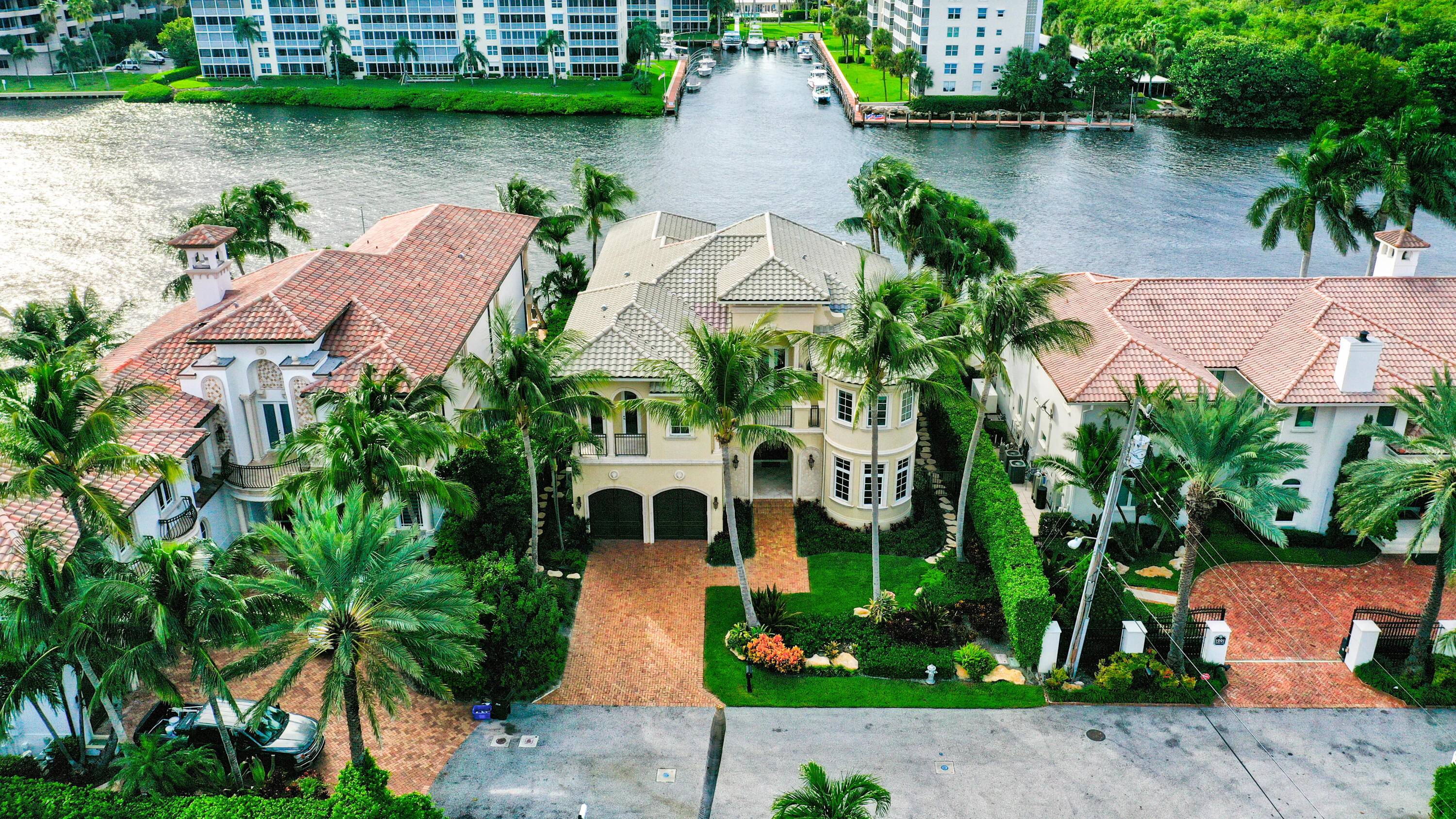 THIS SPACIOUS 5 BEDROOMS 5 BATHROOMS HOME IS DIRECTLY ON THE INTRACOASTAL !