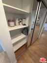 Hallway closet opened showing