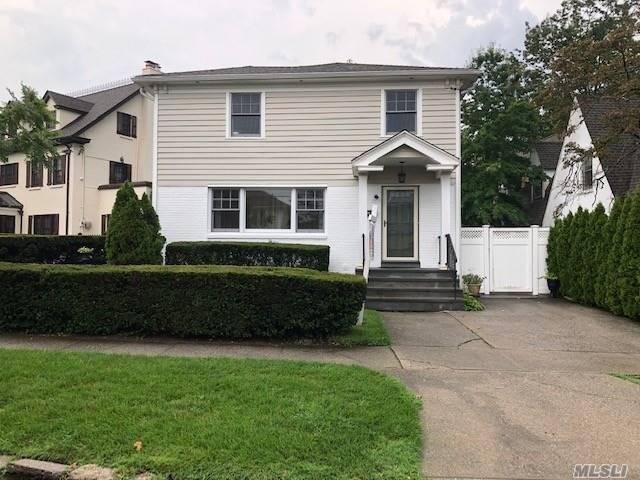 Beautiful colonial home in the heart of Little Neck Hills The best black features Three bedrooms three full baths finished basement close to all.