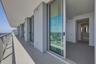 Sliding doors and balcony off each room