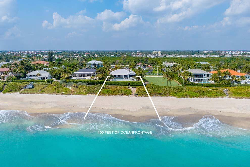 This completely renovated, elegant residence takes full advantage of its 100 feet of ocean frontage.