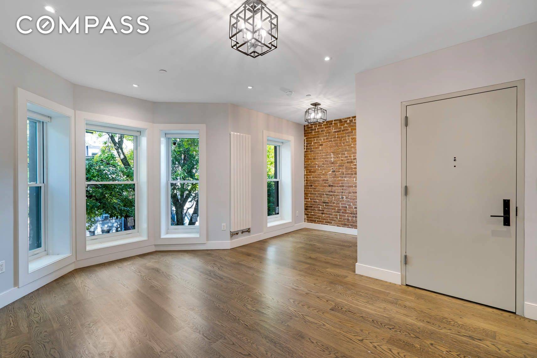 No detail spared in this beautiful fully renovated second floor apartment.
