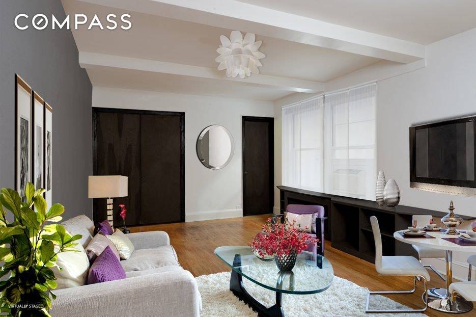 In a beautiful prewar doorman coop nestled in the heart of Greenwich village this renovated studio offers great space in a fantastic location.
