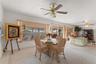 Reverse view of informal areas with view of sun room