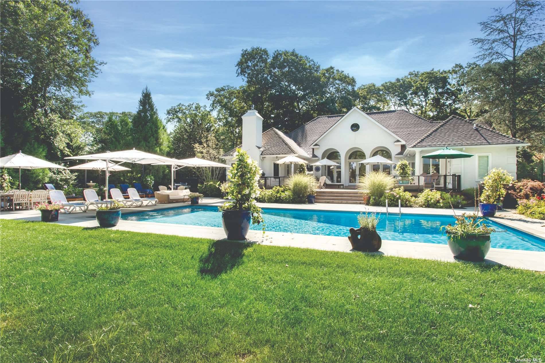 Located in prestigious Cedar Lane community, this custom designed home offers 3100 sqft of easy living.