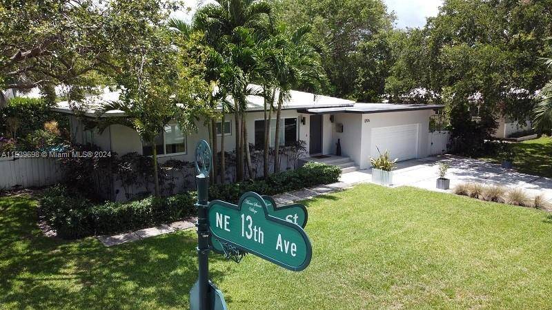 MID CENTURY MODERN HOME IN THE MOST DESIRABLE LOCATION IN MIAMI SHORES ACROSS FROM MULTI MILLION DOLLAR WATERFRONT HOMES !