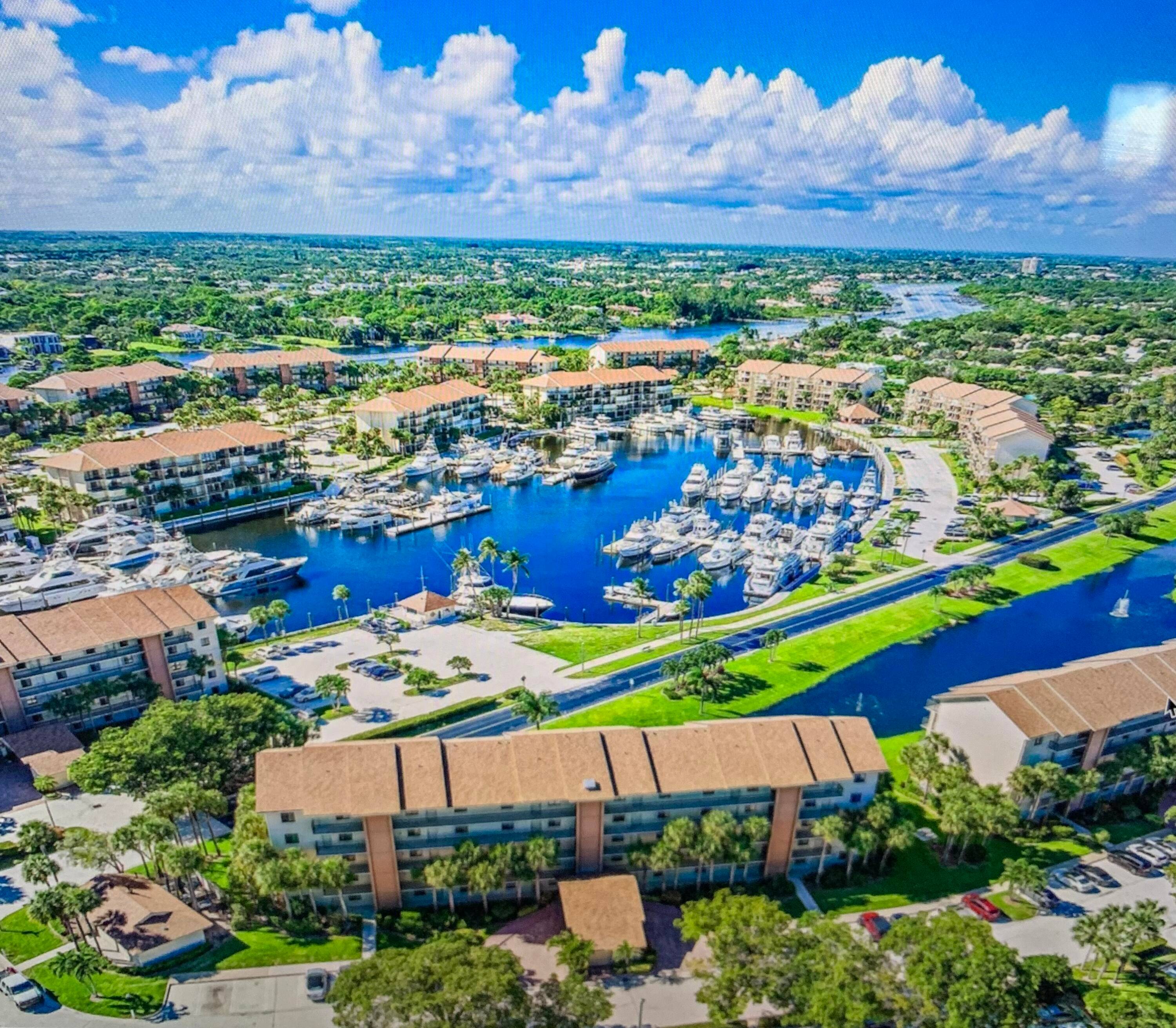 Highly sought after Marina at the Bluffs this condo overlooks the Marina and lake with a spacious covered dining alcove balcony complete with impact resistant sliding glass doors.