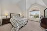 Notice the angled ceilings and gorgeous window!