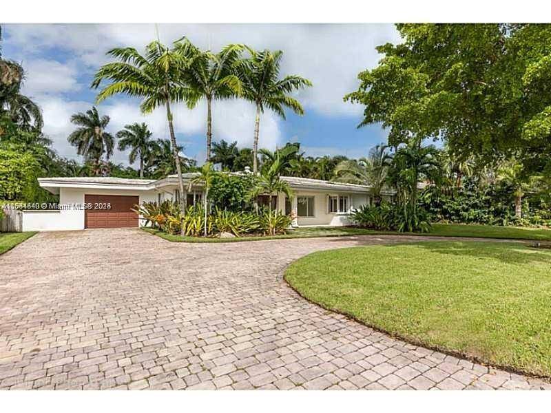 This home truly offers the best of Eastern Miami Shores living with an unbeatable location, being steps from the bay on an enormous lot spanning almost 16000 sqft.