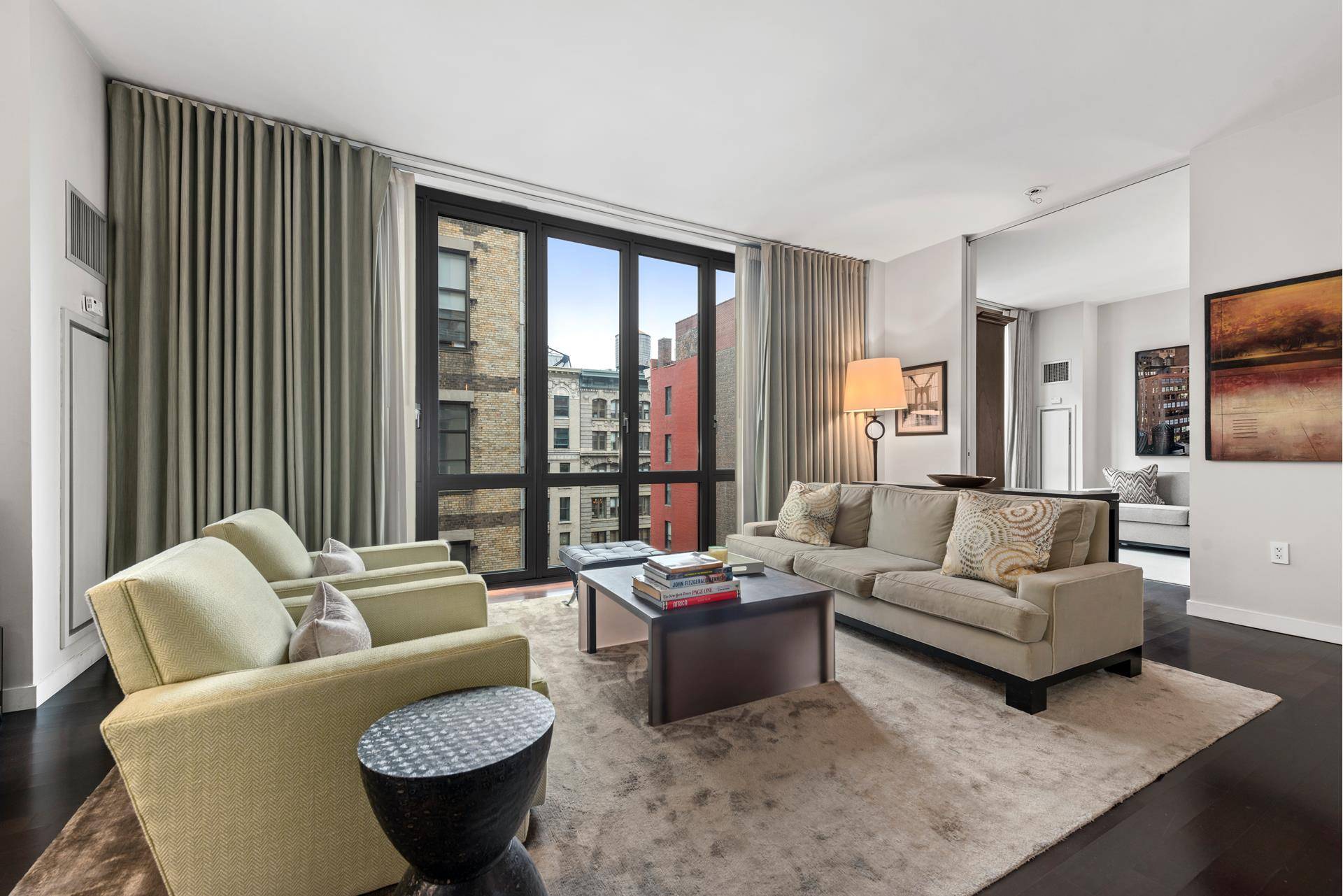 Residence 12A is thoughtfully designed two bedroom loft in the heart of the Flatiron district.