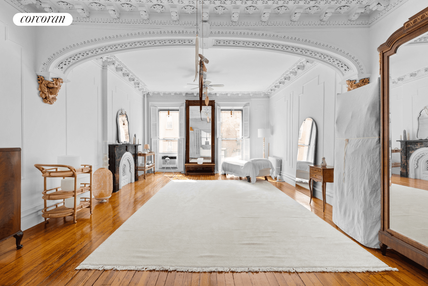 Welcome to a One of One opportunity to own a 25 foot wide, unique, four family, landmarked prewar townhouse on one of the most beautiful blocks in all of Chelsea.