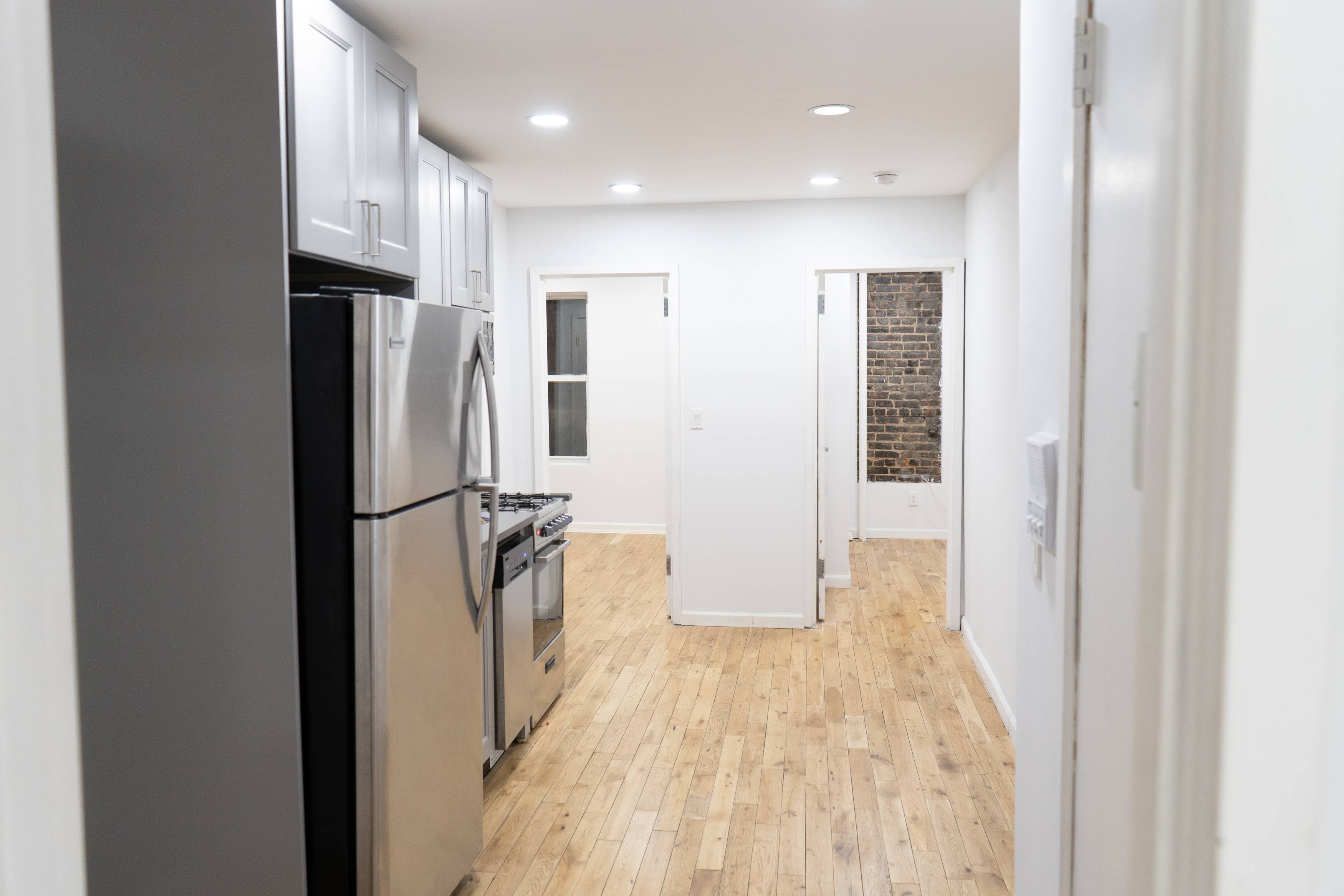 Mulberry Street facing true 4 bedroom 2 bathroom apartment in prime Little Italy.