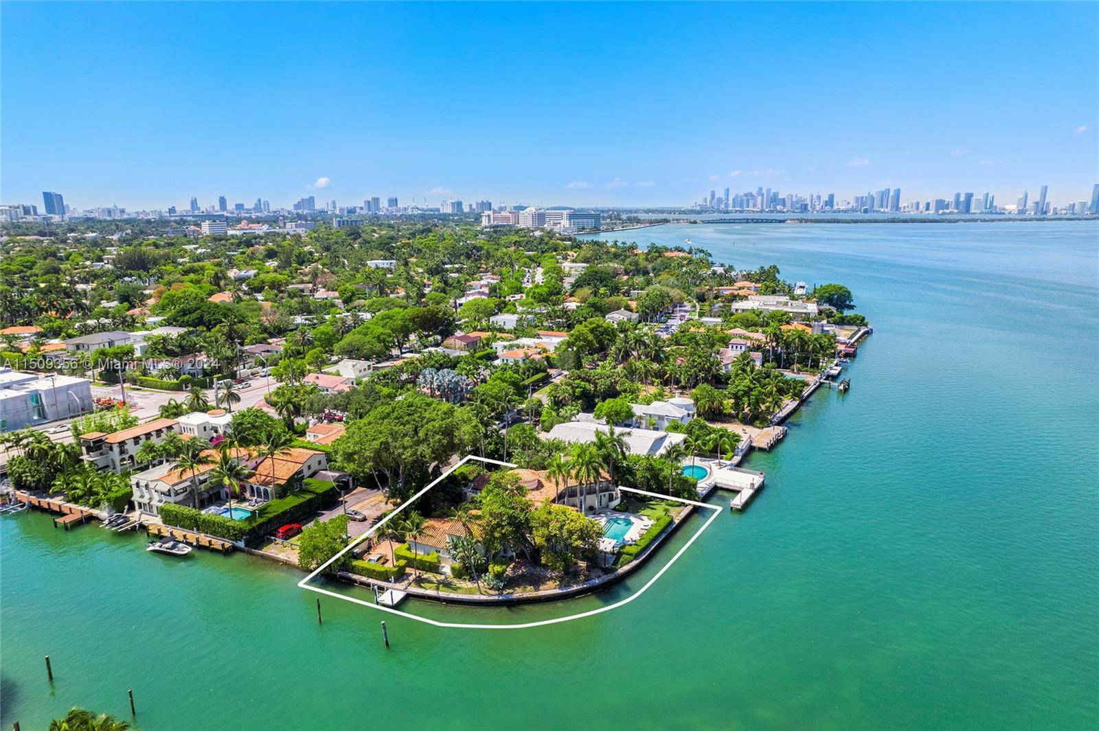 Located on prestigious North Bay Road this 2 story Mediterranean waterfront home sits on a private 20, 100 square foot point corner lot in a cul de sac with open ...