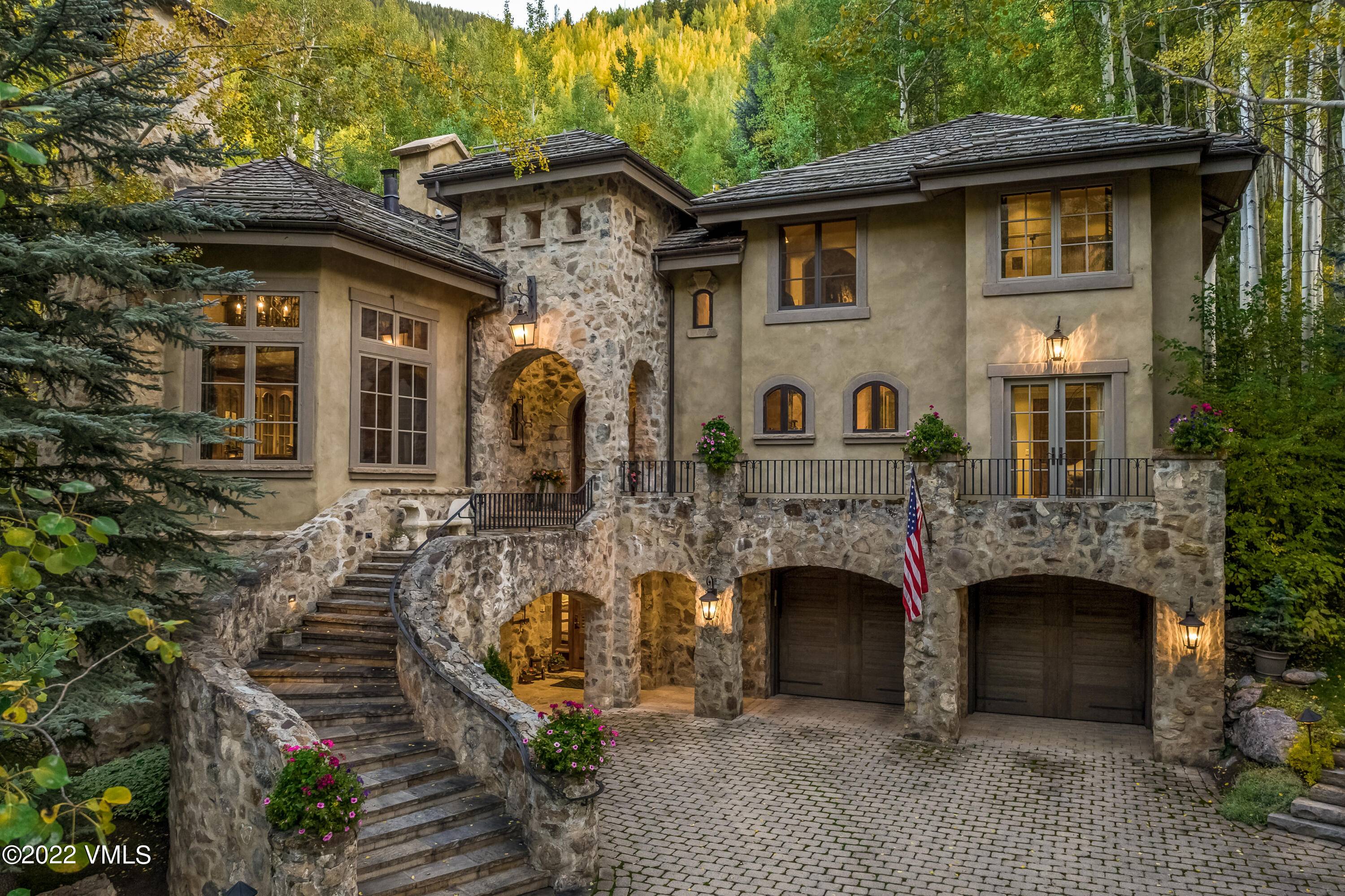Situated on a tranquil cul de sac within a mature stand of towering aspen, this exquisite home borders the White River National Forest while offering convenience to Vail Golf Course ...