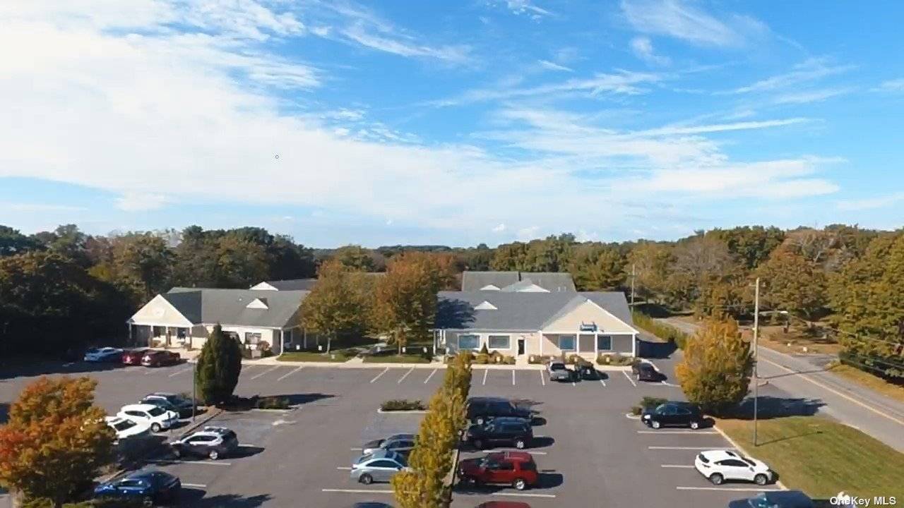 Unique large mixed use commercial center featuring office space, personal services, schools, learning centers and a small church.