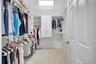 One of Two Primary Bedroom walk-in closets