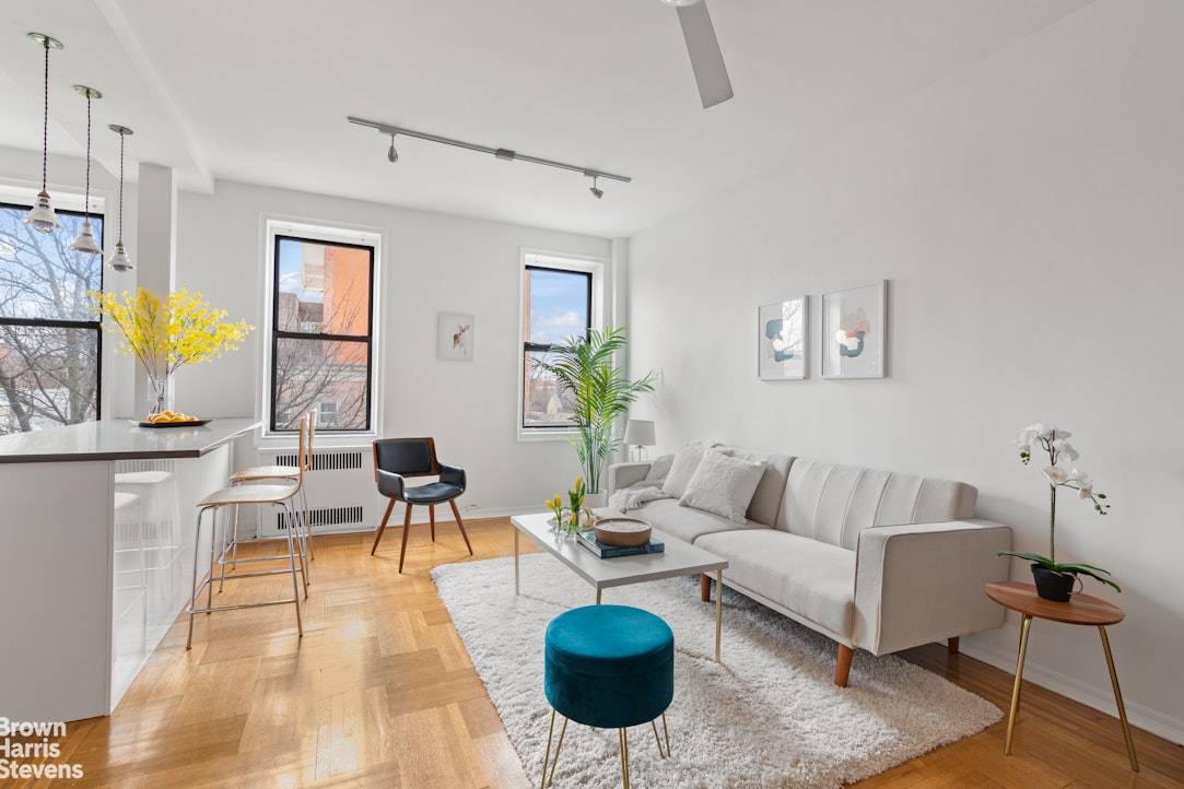 As soon as you enter the large foyer, you feel the sunlight streaming in from bright South facing windows of this beautiful and spacious one bedroom.