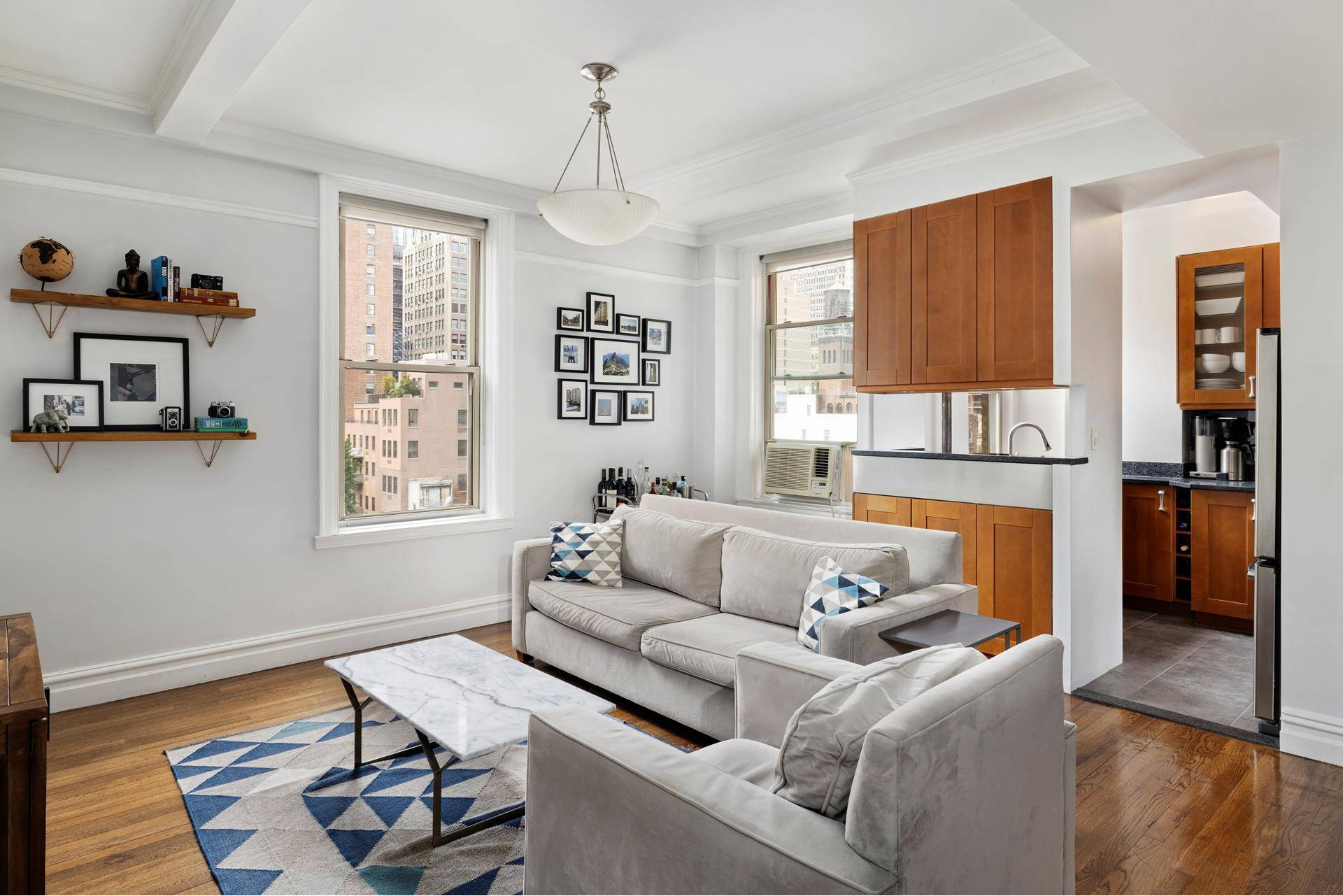 Open city views from this beautifully renovated one bedroom convertible two bed Prewar home.
