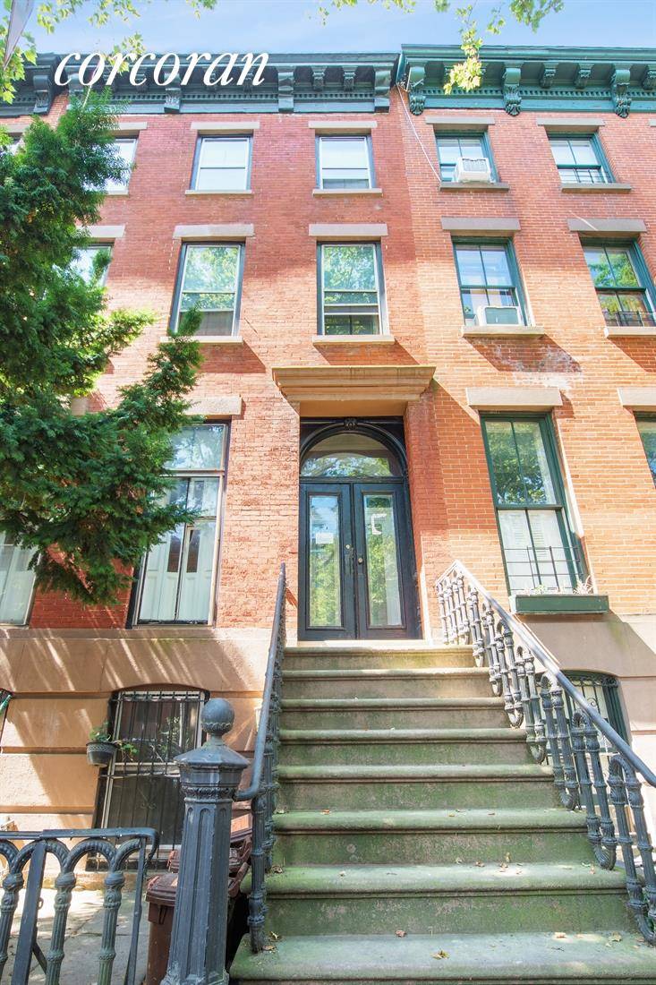 ITALIANATE BEAUTY. Built by John Monas in 1873 1874, during the post Civil War construction boom, this brick townhouse demonstrates a bold and refined facade, with widely spaced acanthus leaf ...