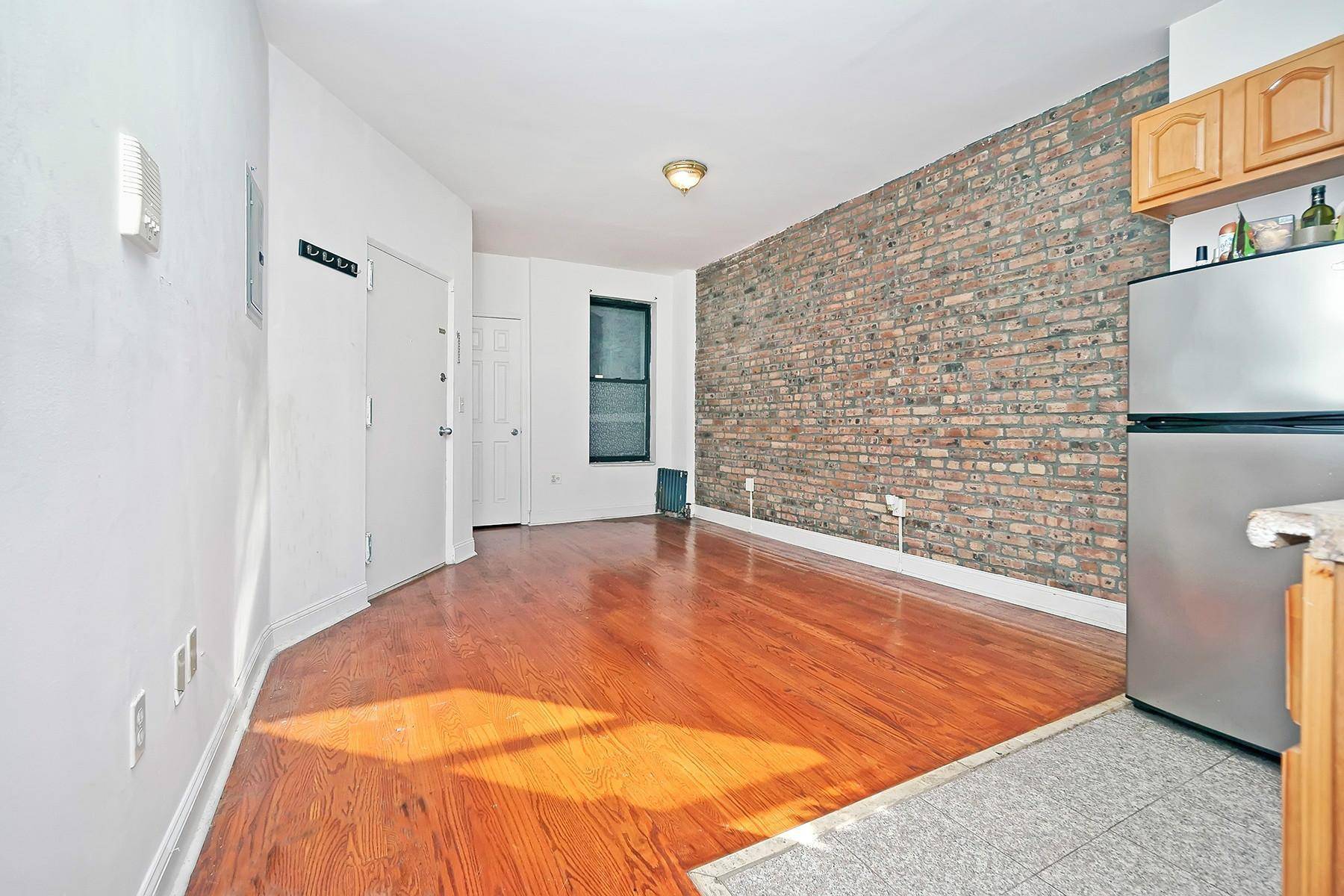 Very large 1 bedroom with exposed brick walls below 125th Street in the Heart of South Harlem.