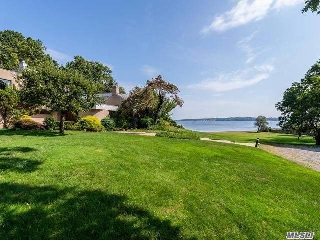 Extraordinary Waterfront 7 Acre property with wide sandy beach on LI Sound perfect for kyacks, paddle boards, and launching small boats.