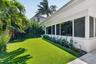 PRIVATE BACK YARD: This wall of new windows in the Sunroom offers a peaceful, calming view of this truly EVER-green very private oasis in the back yar