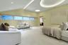 Designed as a private retreat, the primary bedroom combines generous proportions with a tranquil, light-filled setting.