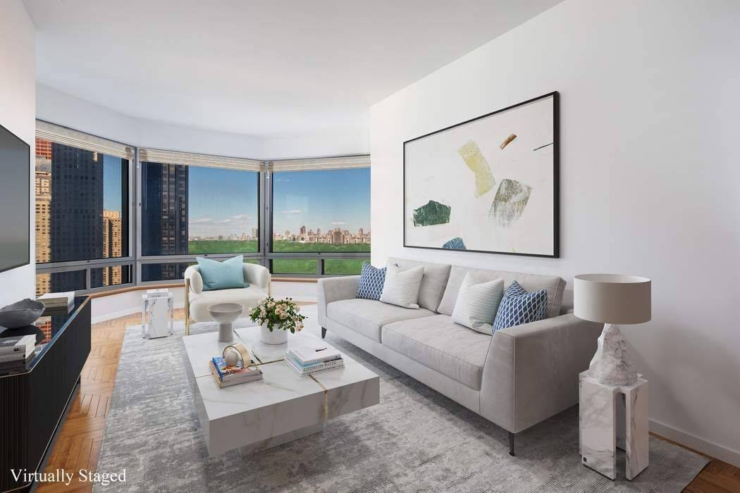 A stunning direct Central Park view from the large corner one bedroom and one bathroom at Central Park Place Condominium.