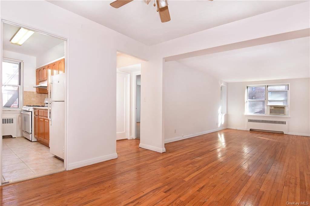 Dash to train from this spacious, freshly painted one bedroom apartment with an indoor garage space.